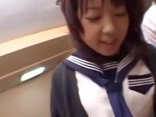 Girls urinate on a teenager